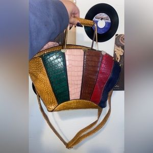 A tan multicolor purse